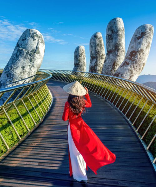 Tourist walking at Golden bridge in Bana hills, Da nang, Vietnam.